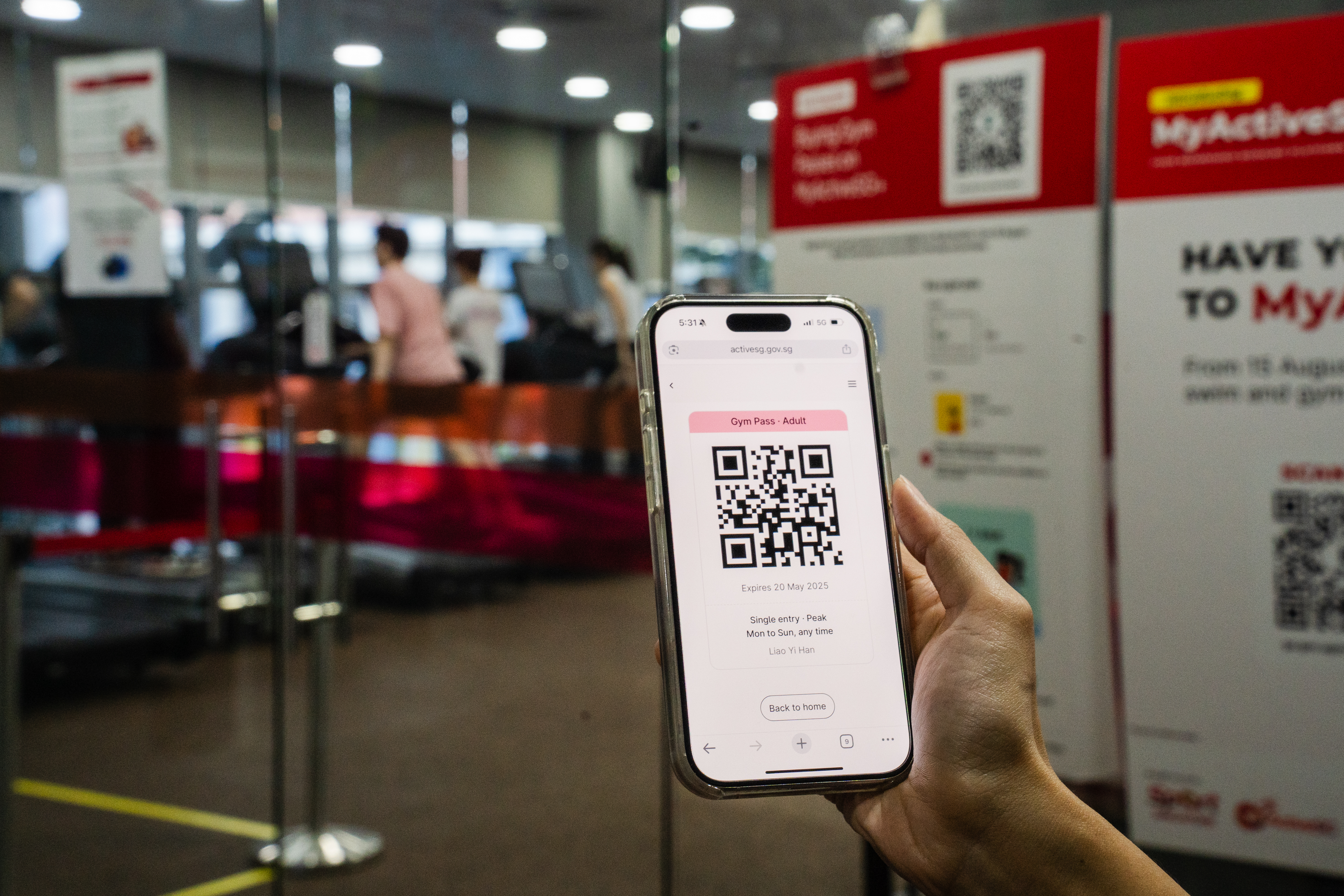 Person using ActiveSG app